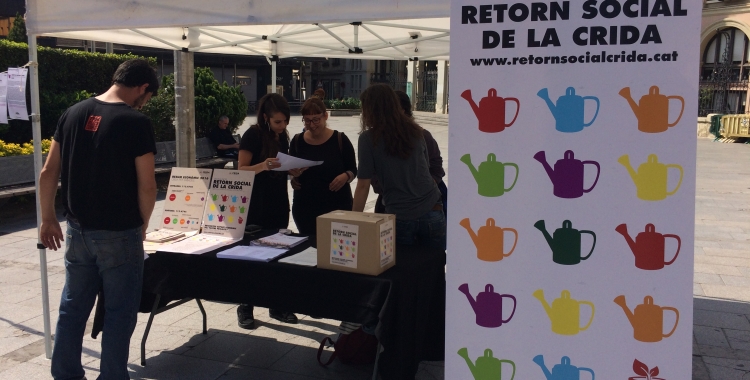 La parada informativa del Retorn Social a la plaça Doctor Robert