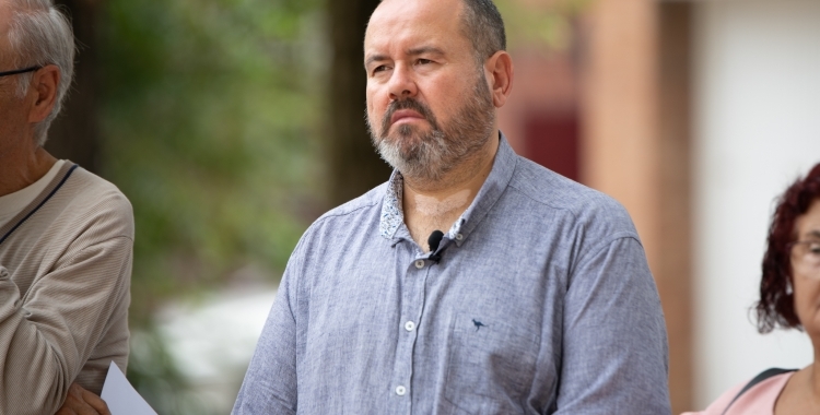 Joan Mena durant un acte en una imatge d'arxiu