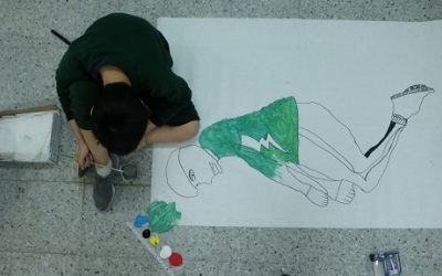 Un dels infants participants d'un taller dels Croma | UAB