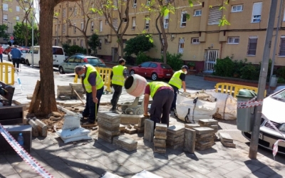 Un grup d'operaris, a Espronceda | Karen Madrid