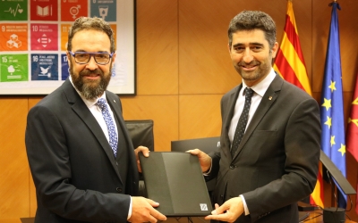 Juli Fernàndez i Jordi Puigneró durant el traspàs de carteres | ACN