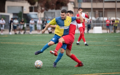 Un instant del derbi de la primera volta | Roger Benet