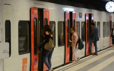 Usuaris agafant el tren | Roger Benet